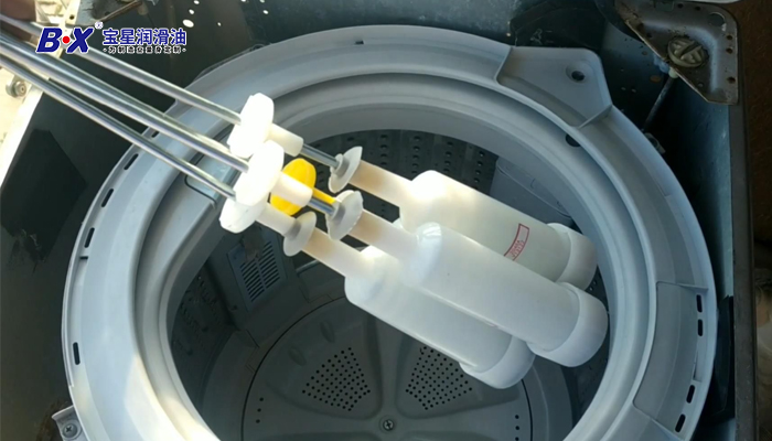 Application of lubricating grease in washing machines